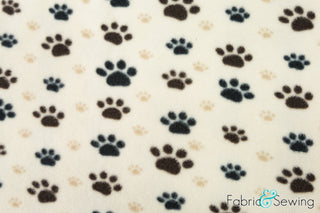 Buy puppy-paws-brown Plush Paws Anti-Pill Polar Fleece Fabric Polyester 13 Oz 58-60"